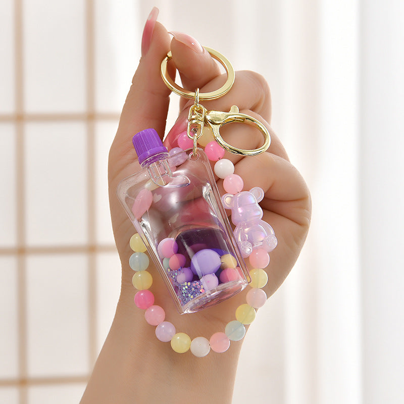Wholesale Oil Quicksand Bottle Pearl Chain Acrylic Liquid Keychain